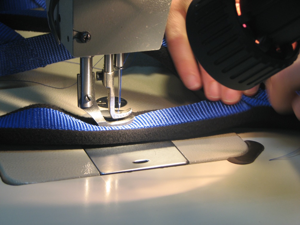 Laura working on a harness